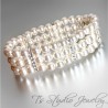 Three Strand Ivory Pearl Bracelet with Gold Rhinestone Spacers
