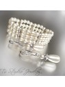 Three Strand Ivory Pearl Bracelet with Silver Rhinestone Spacers